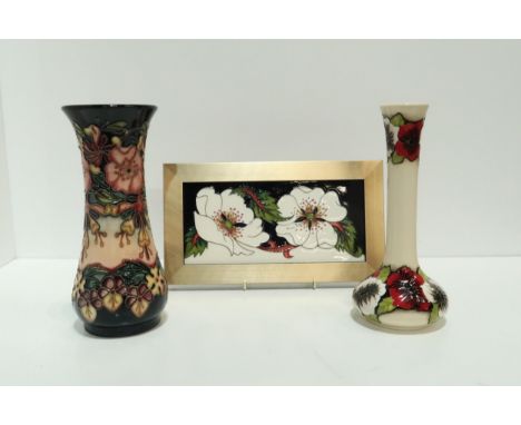 A Moorcroft Oberon pattern vase, together with a framed Moorcroft tile and a red and white flower decorated vase Condition Re