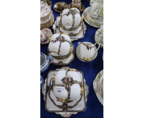 A Paragon Romney pattern tea set comprising twelve cups, saucers and plates, two cake plates, milk jug and sugar bowl Conditi