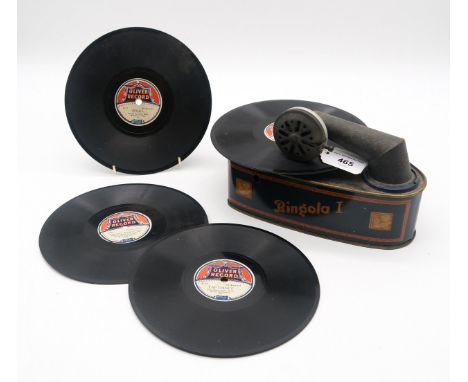 A Bingola 1 tin record player Int. reg. Made in Germany with four various Oliver Record discs Condition Report:Available upon