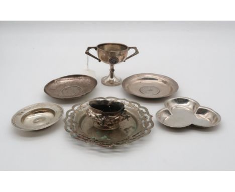 A collection of silver comprising a silver miniature twin handled trophy cup, by E Edmonds, Birmingham, a silver dish, by Asp