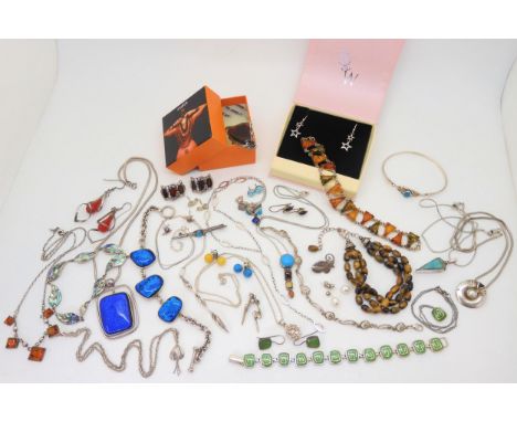 A collection of silver mounted amber jewellery, dichroic glass pendant and bracelet, an Ola Gorie fushia pendant and other it