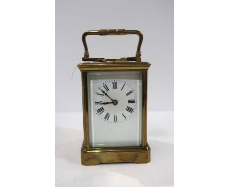A French brass and glass repeating carriage clock Condition Report:has key but does not wind