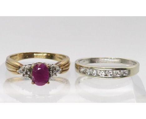 A 9ct gold ruby and diamond accent ring, size P, together with a 9ct white gold cz ring size P1/2, weight together 4.7gms Con