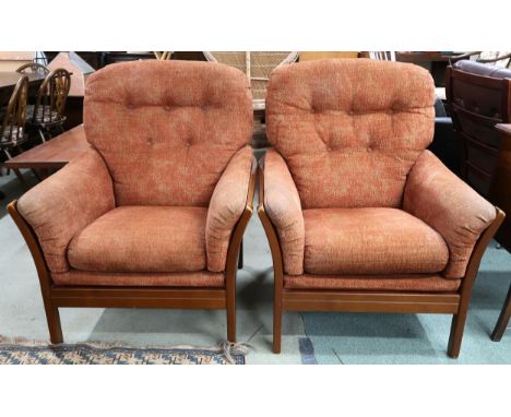 A pair of Ercol elm and beech framed armchairs with terracotta upholstered cushions, 100cm high x 79cm wide x 84cm deep Condi