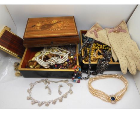 A pair of vintage evening gloves, a marquetry jewel box filled with beads,&nbsp; costume jewellery etc Condition Report:No co