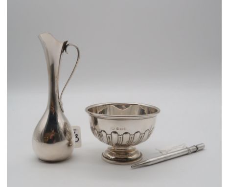 A collection of silver including a footed silver bowl, Birmingham 1934, the body partly fluted, a silver pencil, by&nbsp;John