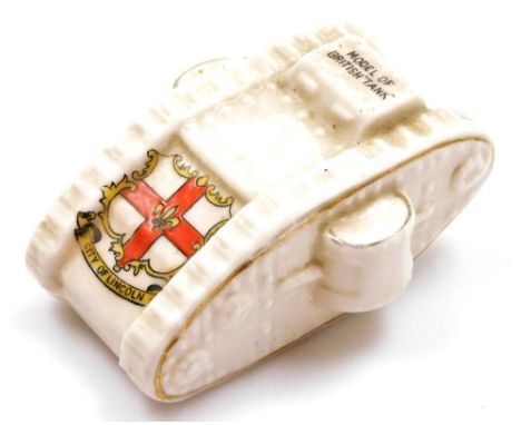 A Willow Art crested ware model of the British tank for the city of Lincoln, registered number 653588, 9cm wide. 