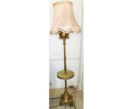 An Evereds Duplex brass and onyx standard oil lamp, converted to electricity, with a reeded column and base, on four splay sh