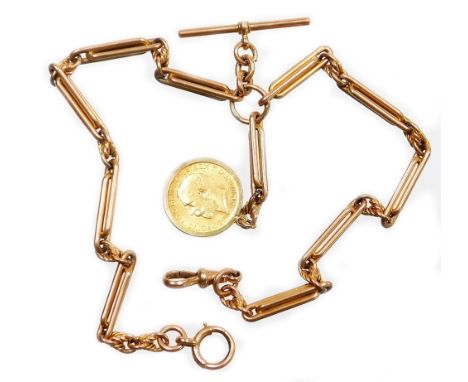A 9ct gold watch chain, with clip T bar and applied George V full gold sovereign dated 1912, in a 9ct gold mount surround, th