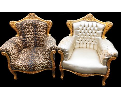 Two gilt framed armchairs, one in a leopard print fabric, with gilt bordering and scrolls, the other in a metallic silver fab