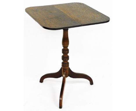 A late 19thC carved oak tripod table, the rectangular top with canted corners, on drop leaf top with tripod base, 55cm wide, 