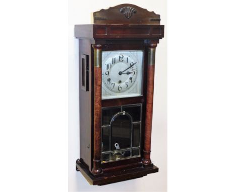 A 1920s mahogany cased wall clock, the rectangular silvered colour dial, key wind with blue hands, in a mahogany frame, with 