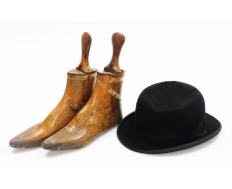 A pair of vintage beech shoe trees and a bowler hat, the hat for Dunn &amp; Co, (3)