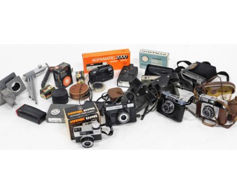 Various camera equipment, to include a Noma camera, Omo camera, Cosmic 135MS, various flashes, Agfamatic 2000, etc. (1 box)