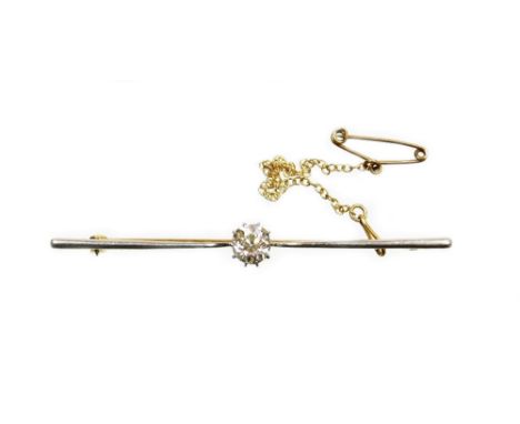 A diamond set bar brooch, the central old cut stone in claw setting, 5.8mm x 5.4mm x 4.2mm, totalling approx 0.64cts, in a wh