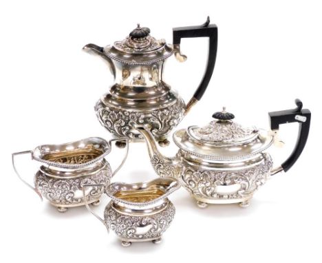 A late Victorian four piece silver bachelors tea and coffee service, comprising coffee pot, 19cm high, teapot, two handled su