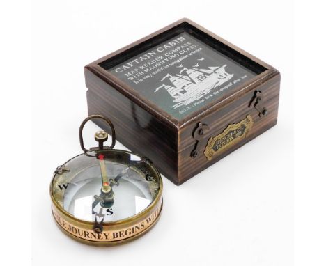 A Captain's cabin map reader compass with magnifying glass, stamped Spencer and Co London 1905, in a navigation wooden box.