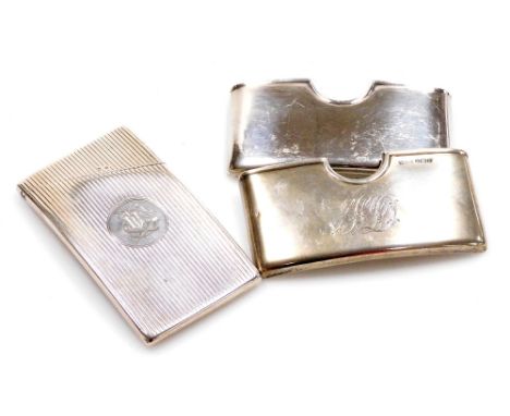 A group of silver, to include a silver cigarette case with engine turned monogrammed decoration with central cartouche bearin