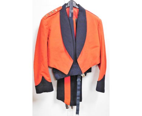 A 1960's red mess kit, with jacket, trousers and waistcoat. 