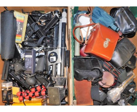 A group of camera accessories and equipment, to include tripods, chargers, flash accessories, cases, straps, etc. (2 boxes)