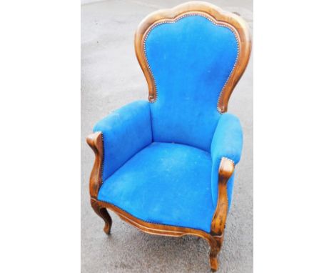 An Oakland bedroom chair, upholstered in blue velvet material, with button back on splayed legs, 120cm high, 66cm wide, 44cm 