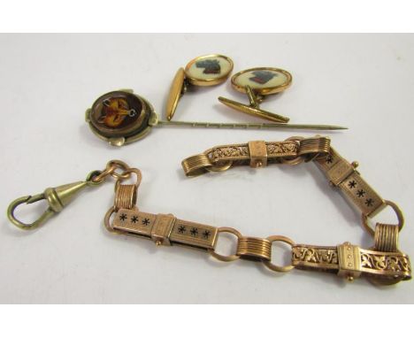 A fancy link Albert chain, yellow metal, 11.2g total weight, tie pin painted with a fox's head, and a pair of oval link cuffl