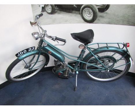 A 1955 Norman of Ashford Cyclemate, registration JD023, 32cc scooter combination bicycle with V5 workshop manual, copy of own