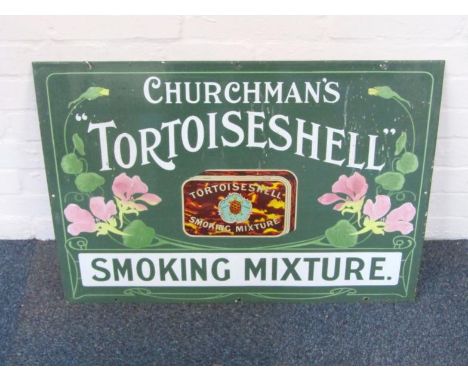 A Churchman's Tortoiseshell Smoking Mixture enamel sign, with Art Nouveau style floral decoration, 50cm high x 72cm wide. 