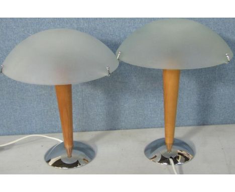 A pair of IKEA wooden and metal table lamps, with domed frosted glass shades, 54cm high.