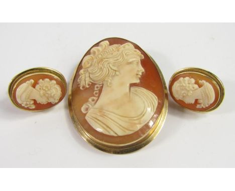 A pair of 18ct gold and shell cameo oval earrings, 7.4g, and a shell cameo pendant brooch, bust portrait of a Roman lady, yel