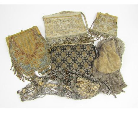 Four early 20thC steel beadwork evening bags, a chain mesh bag and another, (6), (AF).