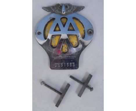An AA aluminium and yellow enamel car badge, No 0851553.