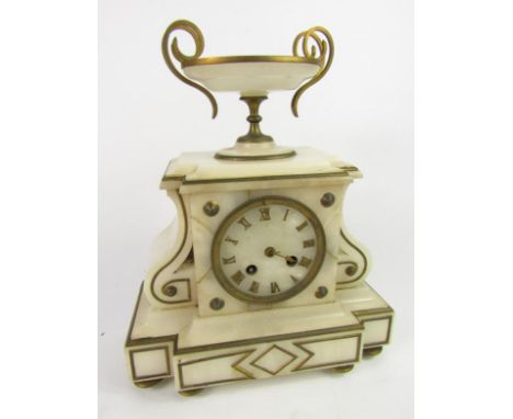 A 19thC French alabaster mantel clock, with eight day movement striking on a bell.