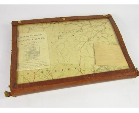 A vintage twelve sheet road map for motorists of England and Wales, in a leather reveal folder.