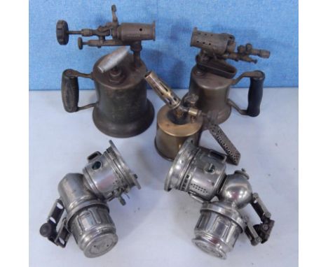 Two Lucas Calcia Major Auto lamps, 98A three manual blow torches marked Turner, Sycamore, Butler 200K and Monitor.