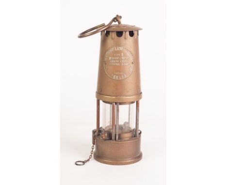 A  BRASS CASED PROTECTOR LAMP AND LIGHTING TYPE 6 MINISTRY OF POWER MINERS SAFETY LAMP 