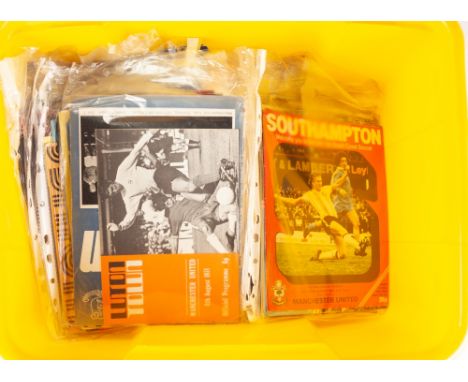 APPROXIMATELY ONE HUNDRED MANCHESTER UNITED AWAY FOOTBALL PROGRAMMES, 1970's/ 80's, including; BOURNEMOUTH, 1982, ARSENAL, 19