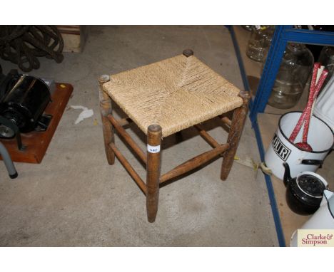 An elm and string seat stool 