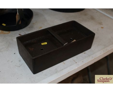 A small cast iron trough 