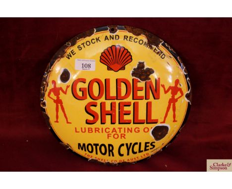 A circular enamel advertising sign for "Golden Shell Motor Cycle Lubricating Oil", 11½" dia. 