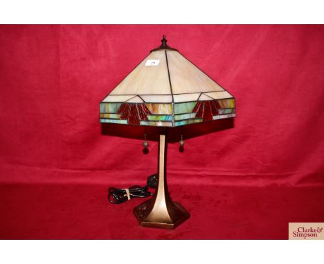 A large Tiffany style table lamp with shade