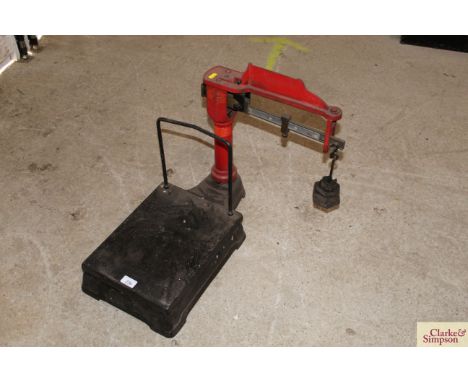 A small set of platform scales with weights to weigh 3kg by 50g increments