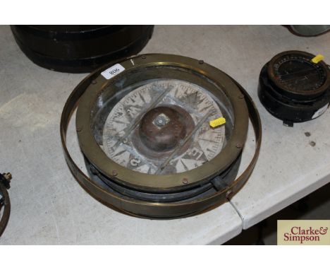 A large gimballed ships deep sea compass