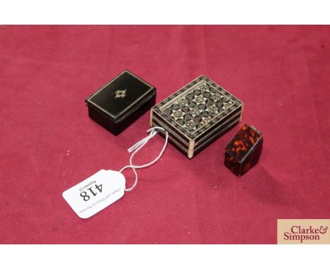 A miniature faux tortoiseshell knife box (from a dolls house); a Victorian papier maché snuff box and an Eastern inlaid box