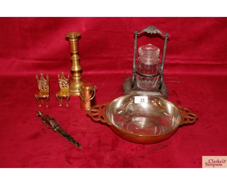 A group of 19th Century brass items comprising of candlestick, heavy brass bowl with two decorative side lug handles; a lidde