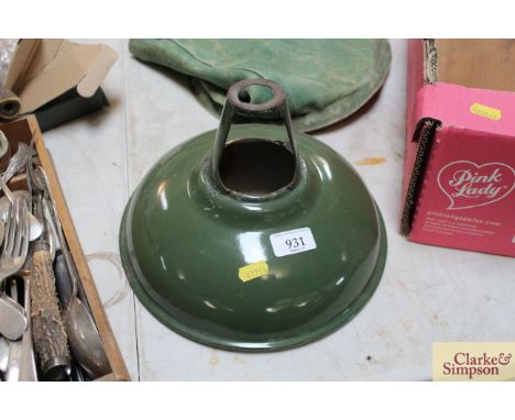 A vintage green enamel lampshade