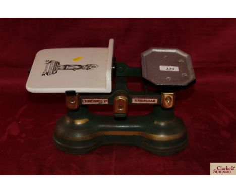 A set of cast iron and brass butchers scales with ceramic tray, made by Josiah Fisher &amp; Son of Banham