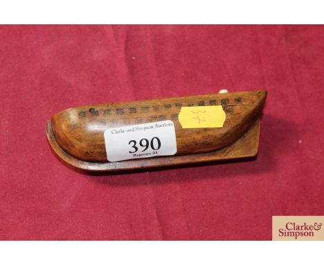 A 19th Century fruit wood snuff box in the form of a ship of the line "Hull"