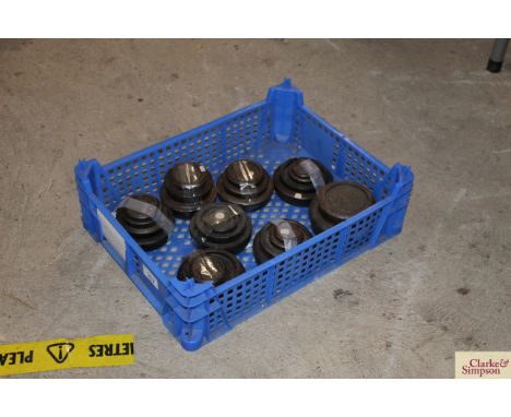 A tray of various graduated shop scale weights, various sizes 