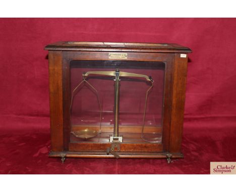 A set of chemists scales by S Parsons &amp; Co. of Bradford in glazed wooden case